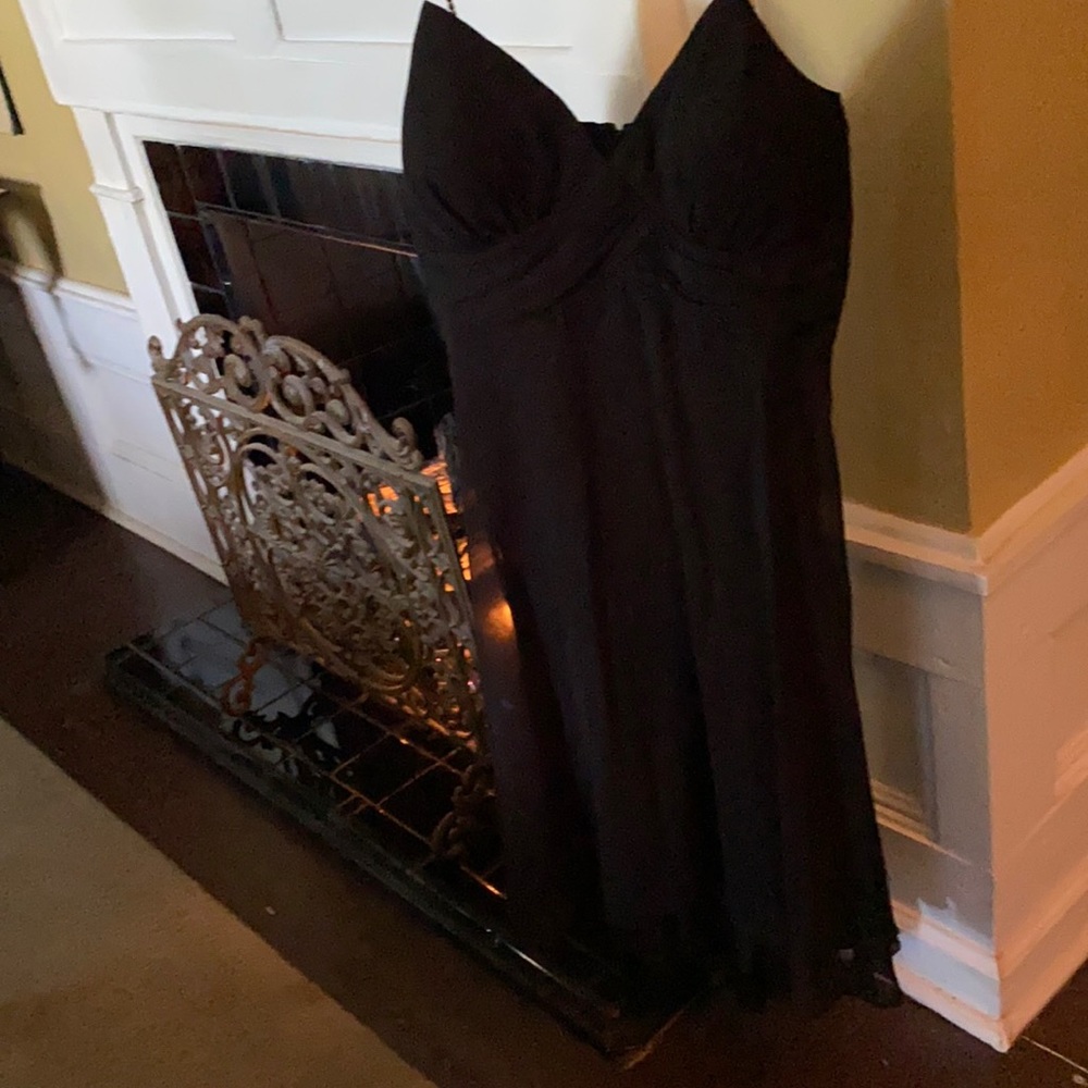 Black party dress with rhinestone straps.